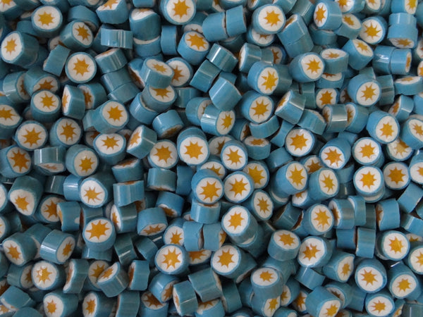 87 Teal/White/Yellow Star 7-8mm